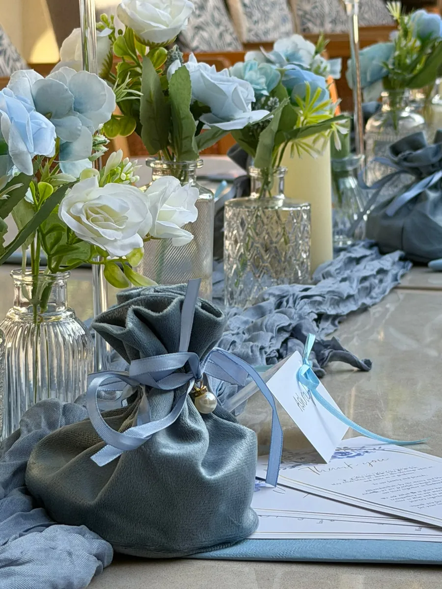 Velvet favour bags at each seat