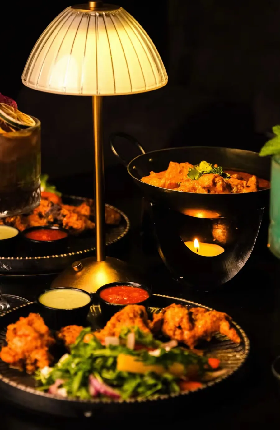 A feast laid out under the table lamp