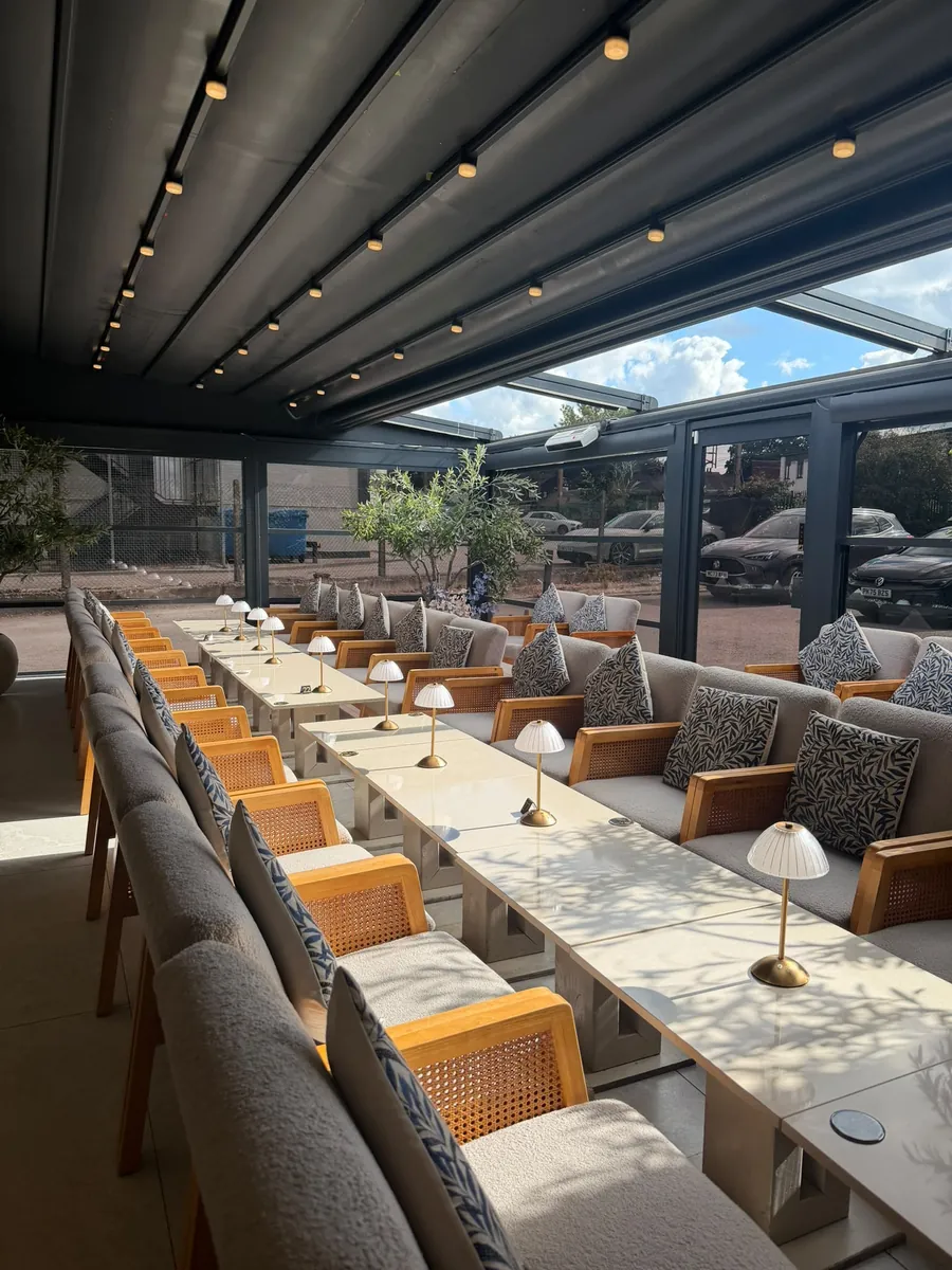 The covered lounge terrace by day
