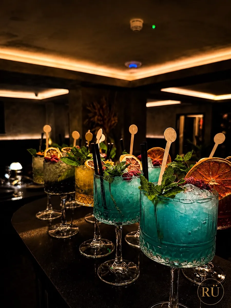 A row of signature mocktails on the bar